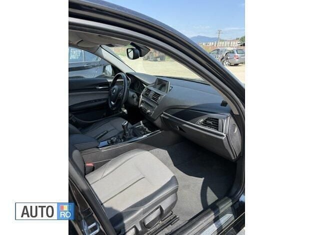 Negru Utilizat 2014 BMW 116 Hatchback | 7.300 EUR (Super Preț) - Imagine 1/4