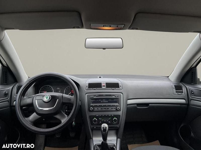 Second-hand Skoda Octavia Ambition 105 CP (77 kW) 2013 Culoarealb Berlinǎ