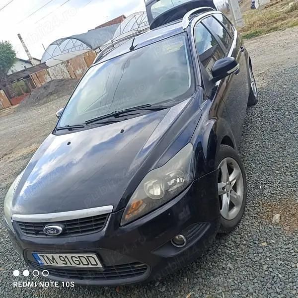 Culoarenegru Utilizat 2010 Ford Focus Break | 2.600 EUR (Preț OK) - Imagine 1/4