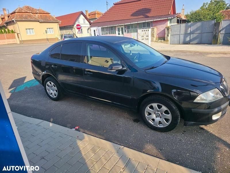 Culoarenegru Utilizat 2005 Skoda Octavia Ambiente Berlinǎ | 2.250 EUR (Preț OK) - Imagine 1/4