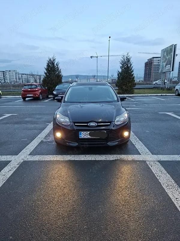 Second-hand Ford Focus Trend 105 CP (77 kW) 2013 Negru Break