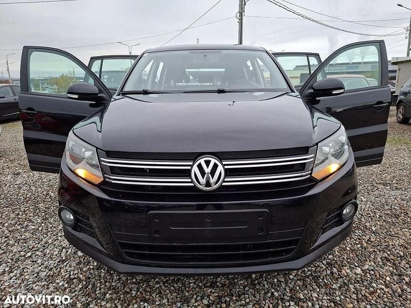 Culoarenegru Utilizat 2014 VW Tiguan SUV | 9.990 EUR (Preț bun) - Imagine 1/4
