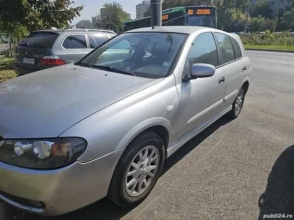 Second-hand Nissan Almera 98 CP (72 kW) 2005 Gri Hatchback