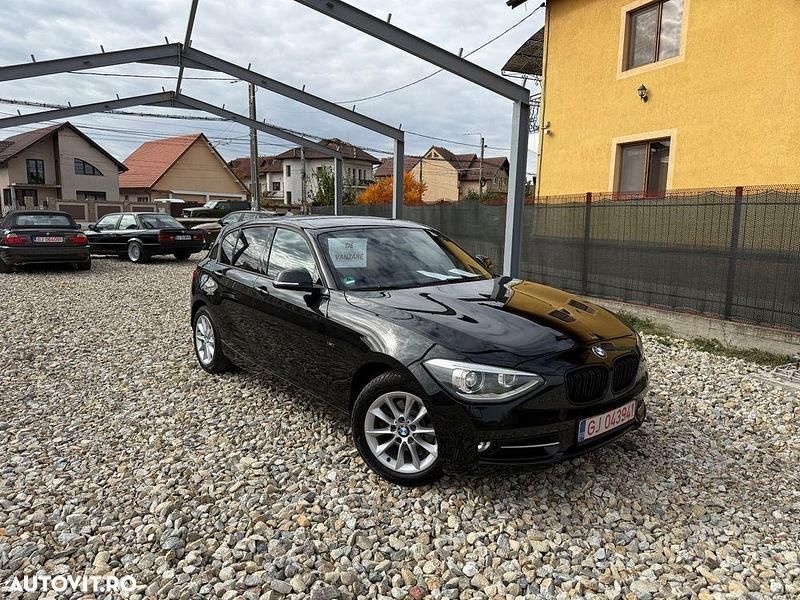 Culoarenegru Utilizat 2012 BMW 118 Sport Line Hatchback | 6.190 EUR (Super Preț) - Imagine 1/4
