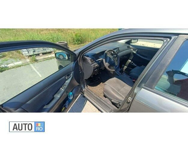 Second-hand Toyota Corolla 97 CP (71 kW) 2003 Gri Berlinǎ
