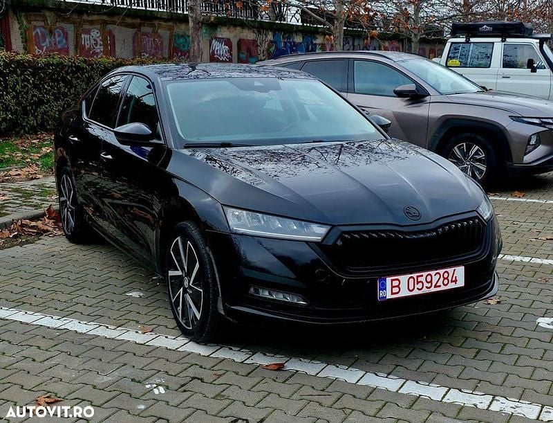 Culoarenegru Utilizat 2021 Skoda Octavia Style Berlinǎ | 15.900 EUR (Preț bun) - Imagine 1/4