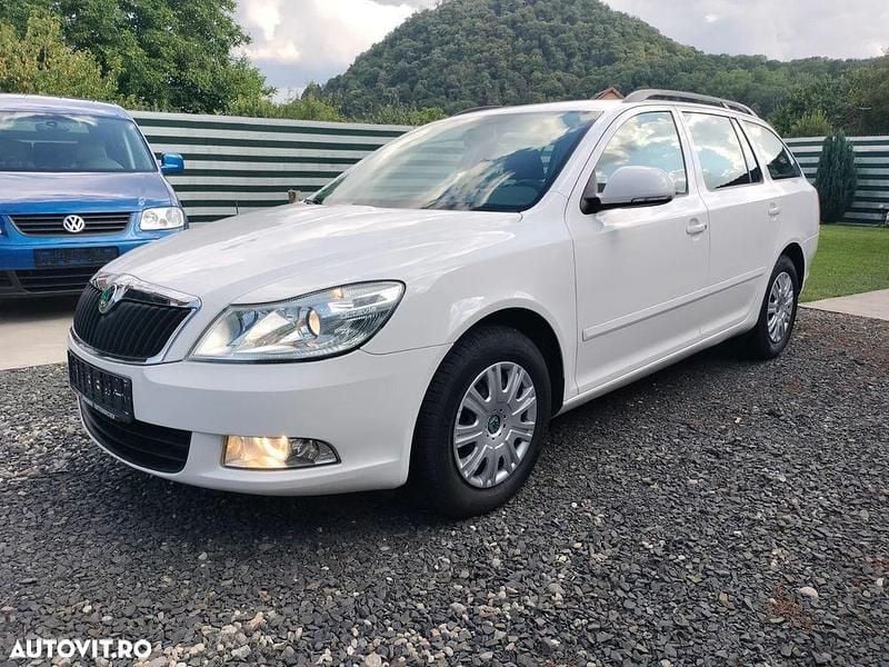 Alb Utilizat 2012 Skoda Octavia Ambiente Break | 4.300 EUR (Preț bun) - Imagine 1/4