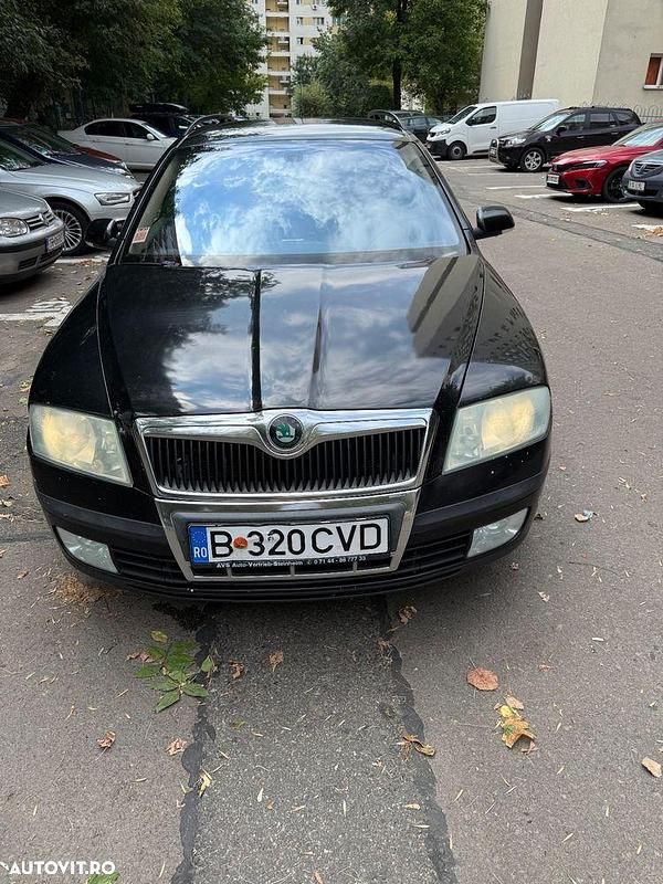 Culoarenegru Utilizat 2006 Skoda Octavia Break | 2.550 EUR (Preț OK) - Imagine 1/4