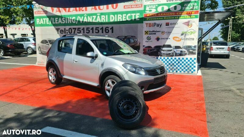 Argintiu Utilizat 2012 Dacia Sandero Stepway Hatchback | 5.499 EUR - Imagine 1/4