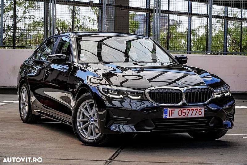 Culoarenegru Utilizat 2022 BMW 320e Comfort Edition Berlinǎ | 23.950 EUR (Preț bun) - Imagine 1/4