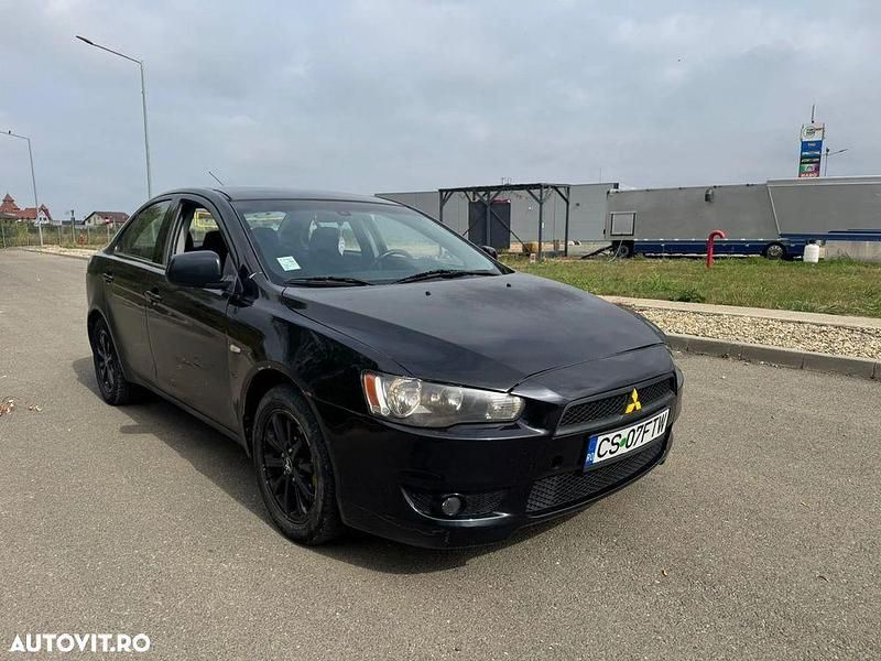 Culoarenegru Utilizat 2011 Mitsubishi Lancer Berlinǎ | 1.999 EUR - Imagine 1/4