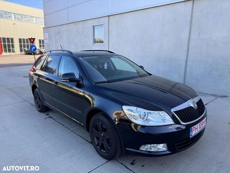 Negru Utilizat 2013 Skoda Octavia Ambition Break | 3.690 EUR (Super Preț) - Imagine 1/4