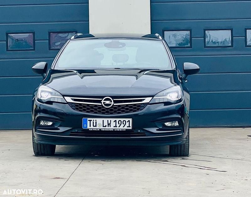Culoarenegru Utilizat 2016 Opel Astra Business Break | 7.290 EUR (Preț OK) - Imagine 1/4