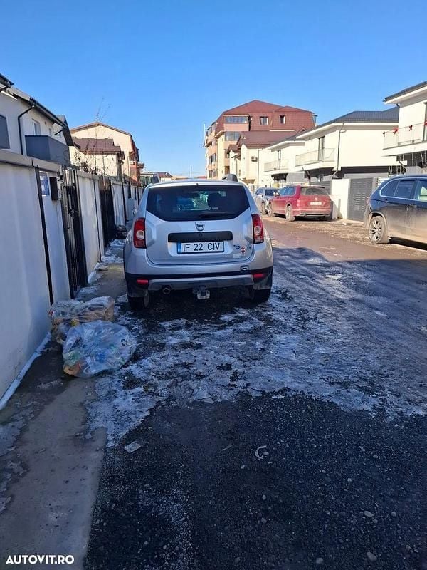 Second-hand Dacia Duster 105 CP (77 kW) 2012 Culoareargint SUV