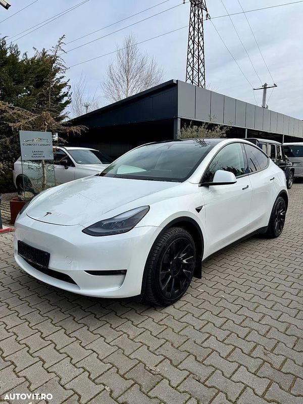 Second-hand Tesla Model Y 378 kW (514 CP) 2024 Culoarealb SUV