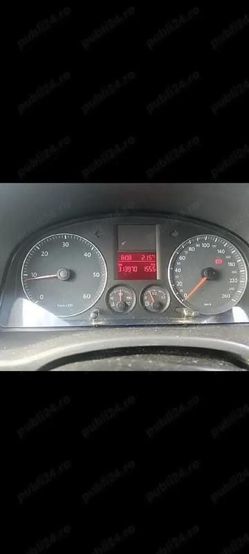 Second-hand VW Caddy 105 CP (77 kW) 2009 Argintiu Monovolum