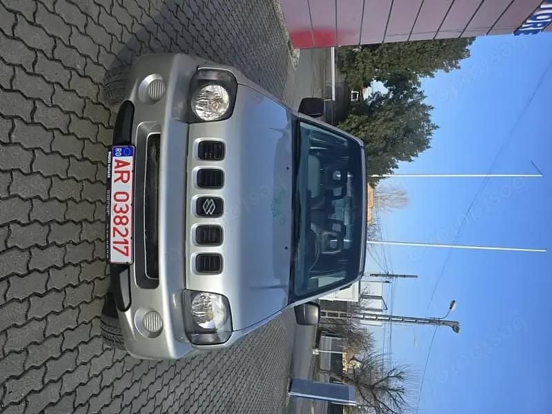 Second-hand Suzuki Jimny 80 CP (58 kW) 2003 Auriu SUV