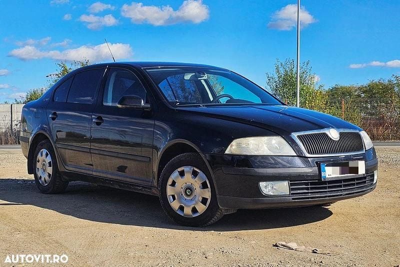 Culoarenegru Utilizat 2006 Skoda Octavia Ambiente Hatchback | 2.500 EUR (Preț OK) - Imagine 1/4