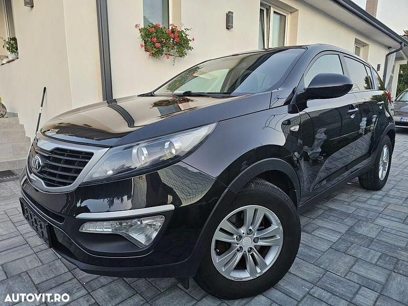 Culoarenegru Utilizat 2013 Kia Sportage SUV | 7.900 EUR (Super Preț) - Imagine 1/4