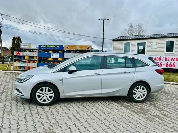 Gri Utilizat 2017 Opel Astra Break | 5.999 EUR (Preț OK) - Imagine 1/4