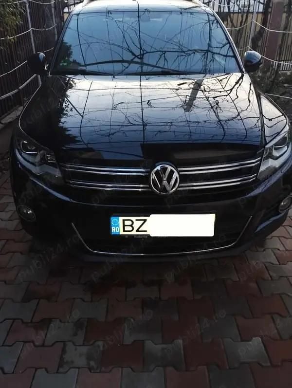 Negru Utilizat 2014 VW Tiguan SUV | 12.300 EUR (Preț OK) - Imagine 1/3