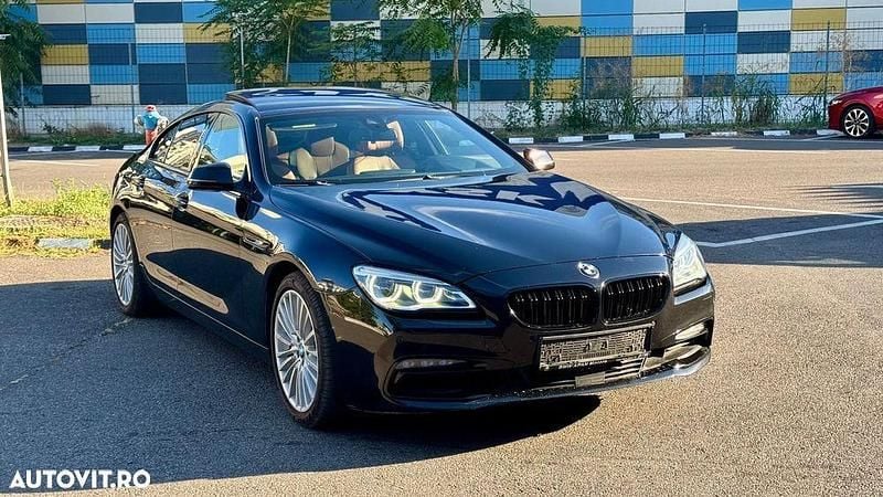 Culoarenegru Utilizat 2015 BMW 640 Comfort Edition Coupe | 17.999 EUR (Preț OK) - Imagine 1/4