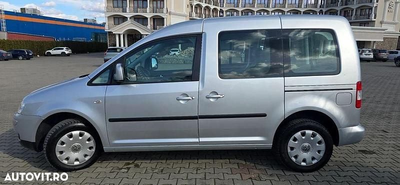 Second-hand VW Caddy Family 102 CP (75 kW) 2008 Culoareargint Monovolum