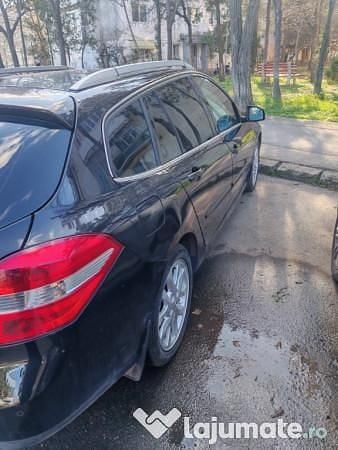 Second-hand Renault Laguna III 110 CP (80 kW) 2009 Negru Hatchback