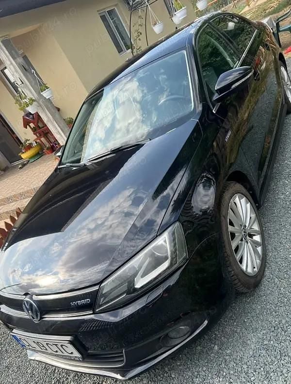 Utilizat 2014 VW Jetta Hybrid Berlinǎ | 8.700 EUR - Imagine 1/4