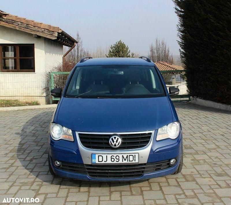 Second-hand VW Touran 105 CP (77 kW) 2009 Culoarealbastru Monovolum