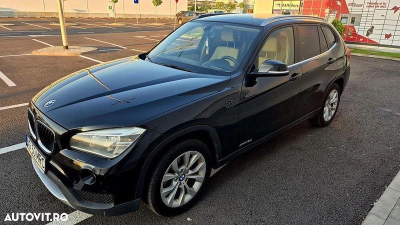 Culoarenegru Utilizat 2013 BMW X1 SUV | 8.400 EUR (Preț bun) - Imagine 1/4