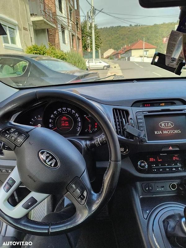 Culoarenegru Utilizat 2013 Kia Sportage SUV | 10.500 EUR (Preț OK) - Imagine 1/4