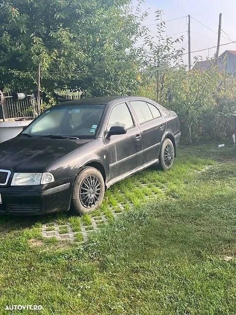 Culoarenegru Utilizat 2006 Skoda Octavia Tour Berlinǎ | 1.700 EUR (Preț OK) - Imagine 1/4