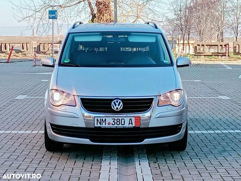 Second-hand VW Touran United 140 CP (102 kW) 2009 Culoaregri Monovolum