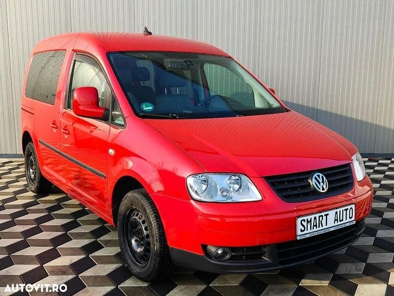 Second-hand VW Caddy Life 105 CP (77 kW) 2009 Culoarerosu Monovolum