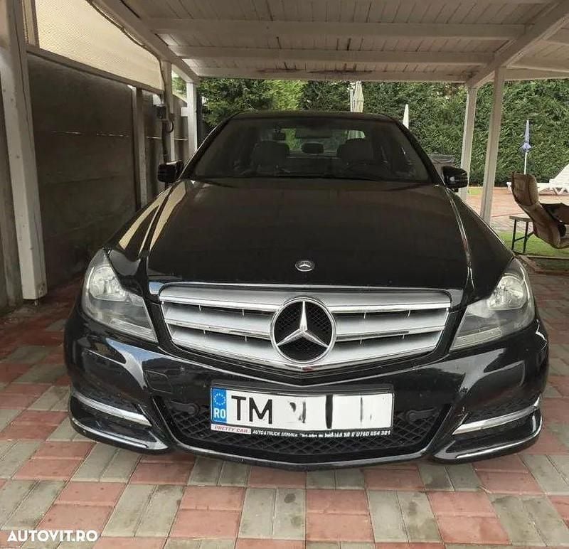 Culoarenegru Utilizat 2013 Mercedes C200 Edition Berlinǎ | 9.000 EUR (Super Preț) - Imagine 1/4