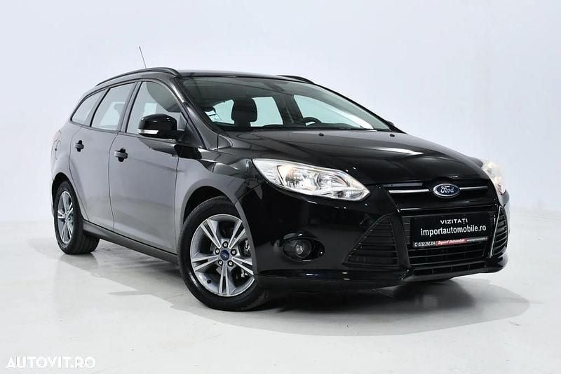 Culoarenegru Utilizat 2014 Ford Focus Titanium Break | 5.500 EUR (Preț OK) - Imagine 1/4
