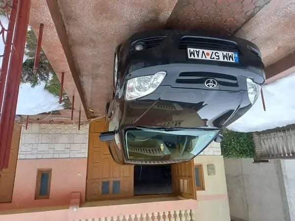 Second-hand Toyota Corolla 90 CP (66 kW) 2006 Negru Break