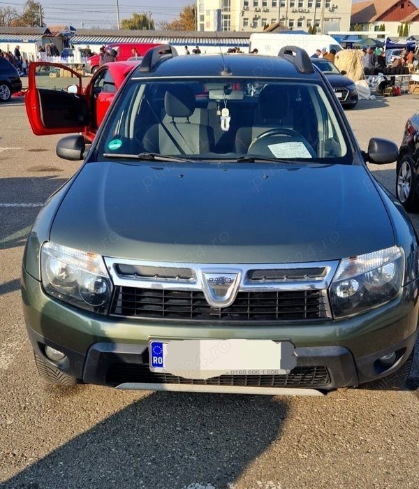 Verde Utilizat 2013 Dacia Duster SUV | 7.149 EUR (Preț OK) - Imagine 1/4
