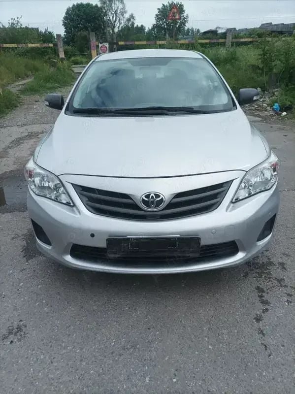 Gri Utilizat 2011 Toyota Corolla Berlinǎ | 4.500 EUR - Imagine 1/4