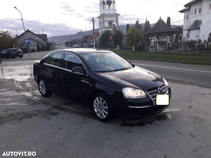 Culoarenegru Utilizat 2010 VW Jetta Comfortline Berlinǎ | 4.950 EUR (Preț OK) - Imagine 1/4