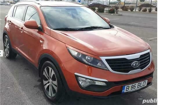Portocaliu Utilizat 2011 Kia Sportage SUV | 8.500 EUR (Preț OK) - Imagine 1/4