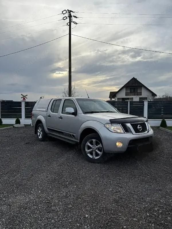 Second-hand 2011 Nissan Navara Pickup | 8.950 EUR (Preț OK) - Imagine 1/4
