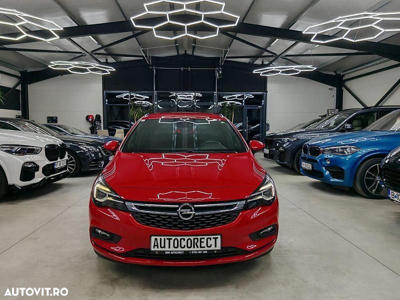 Culoarerosu Utilizat 2016 Opel Astra Dynamic Break | 8.990 EUR (Preț OK) - Imagine 1/4