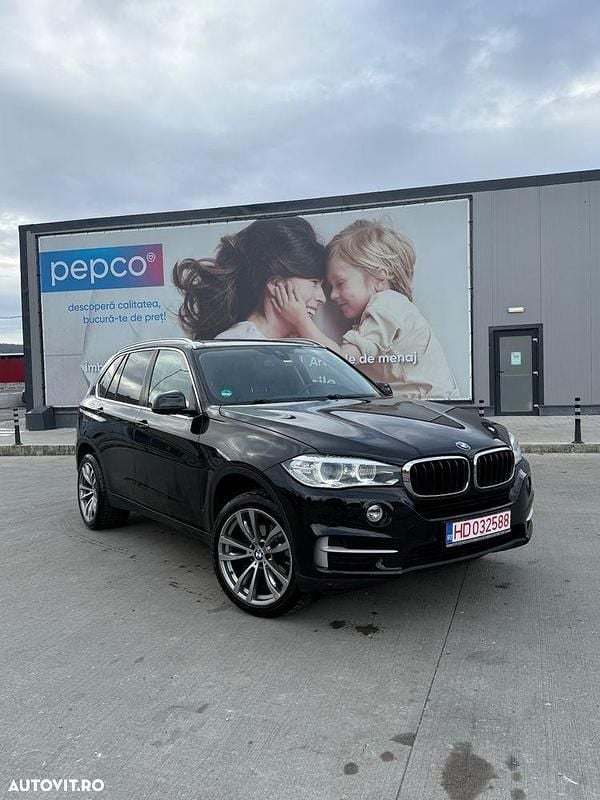 Culoarenegru Utilizat 2014 BMW X5 SUV | 16.999 EUR (Preț OK) - Imagine 1/4