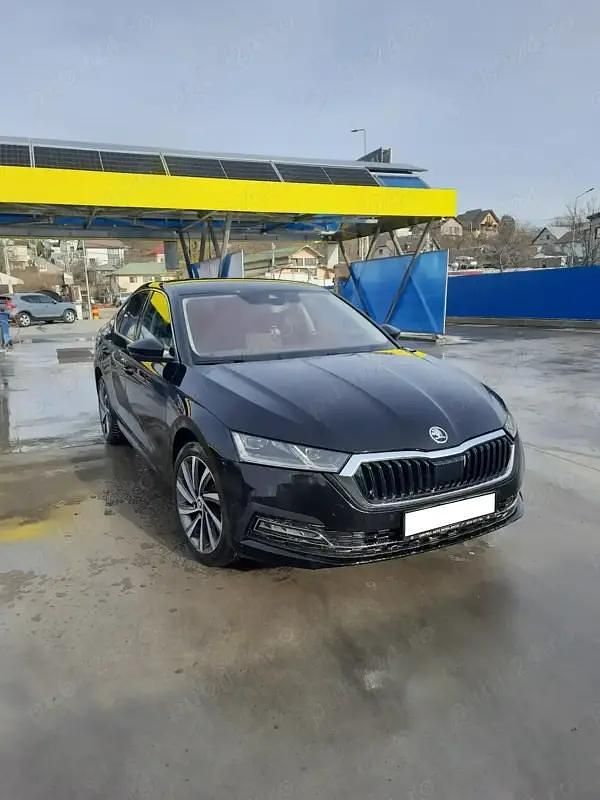 Negru Utilizat 2021 Skoda Octavia Style Berlinǎ | 23.000 EUR (Puțin scump) - Imagine 1/4