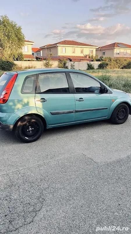 Second-hand 2006 Ford Fiesta Berlinǎ | 650 EUR (Preț bun) - Imagine 1/4