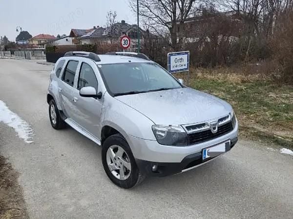 Gri Second-hand 2011 Dacia Duster Berlinǎ | 6.890 EUR (Preț OK) - Imagine 1/4