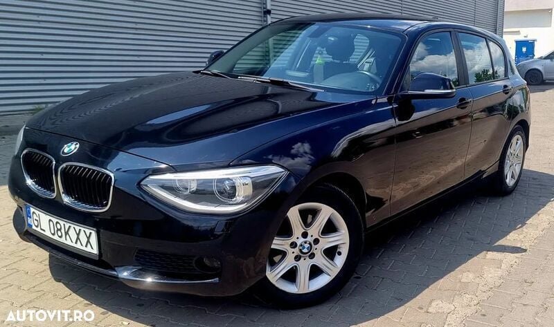 Negru Utilizat 2013 BMW 114 Hatchback | 6.990 EUR - Imagine 1/4