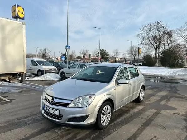 Argintiu Second-hand 2009 Opel Astra Hatchback | 1.800 EUR (Preț OK) - Imagine 1/4